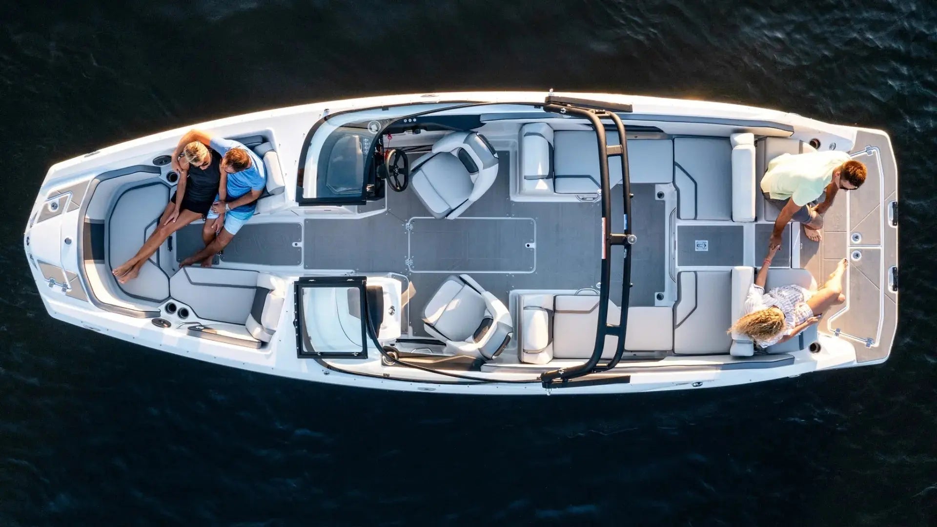 Pontoon boat with EVA foam flooring upgrade - family enjoying non-slip boat deck