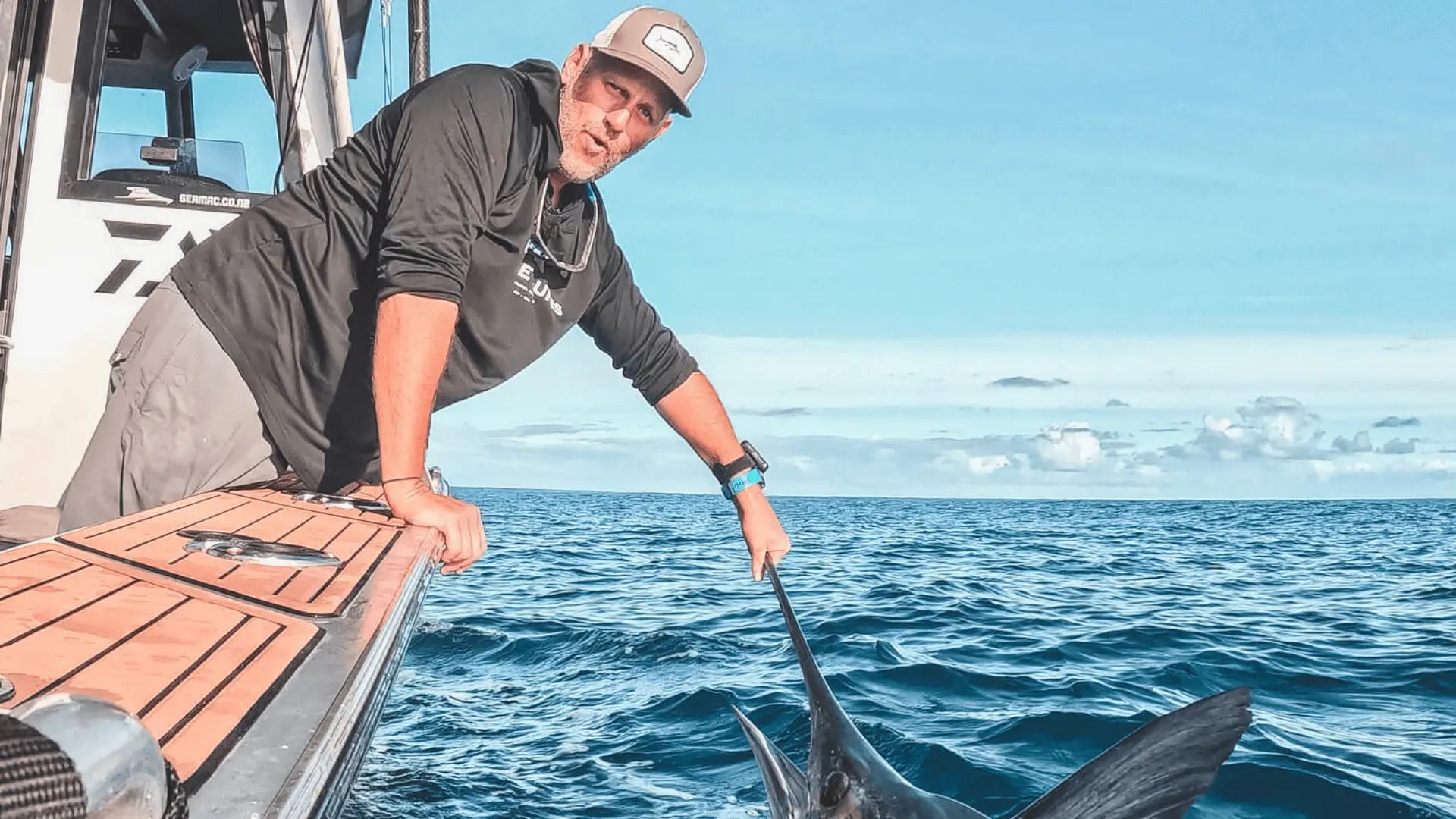 Tampa boater fishing on custom EVA foam boat deck over saltwater