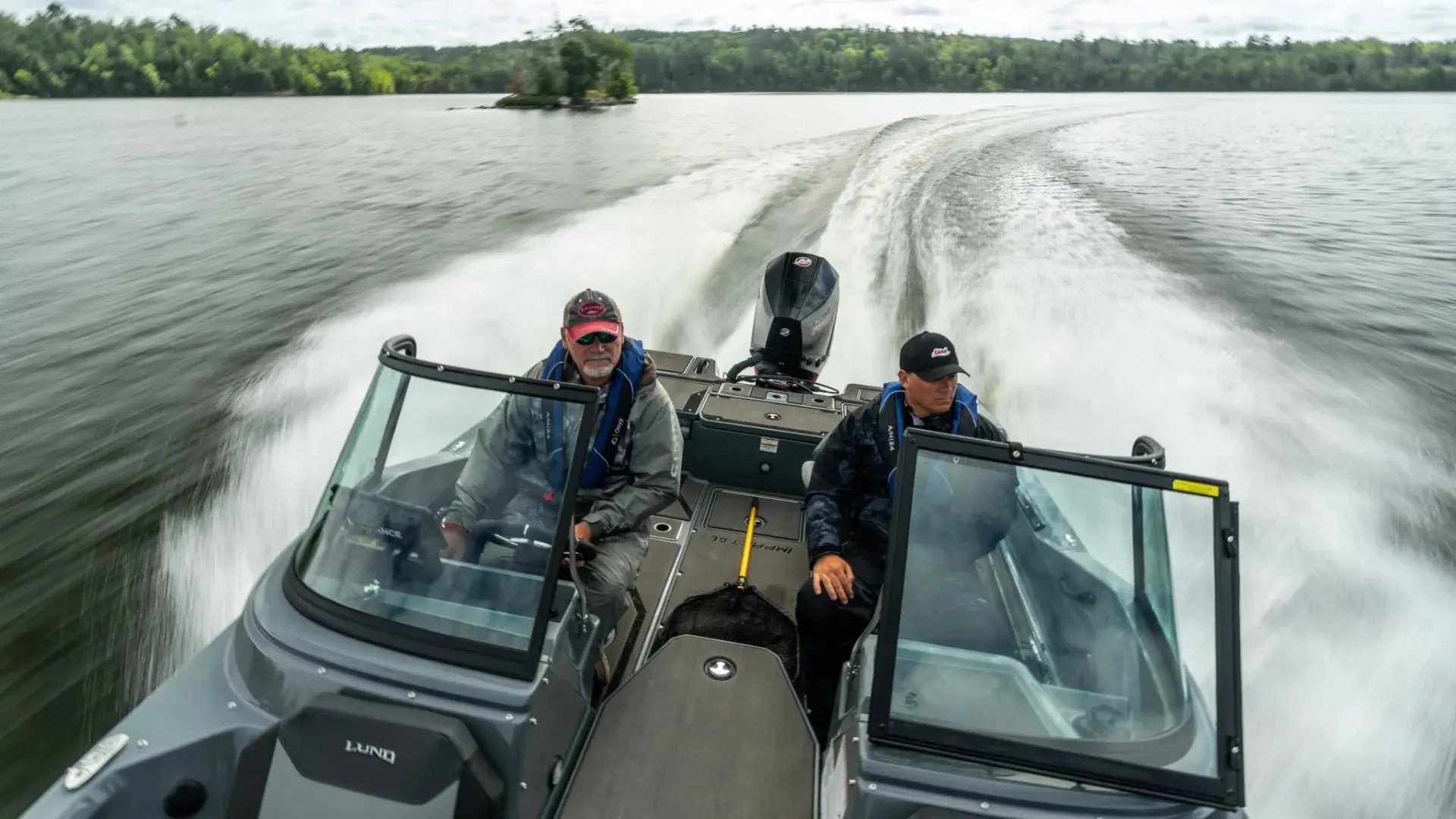 Boat with EVA foam flooring cruising on lake with boaters