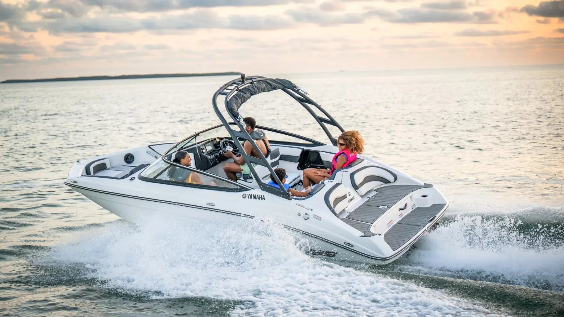 Yamaha boat with family on water, EVA foam boat flooring installation example